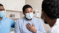 Patient talking to doctor